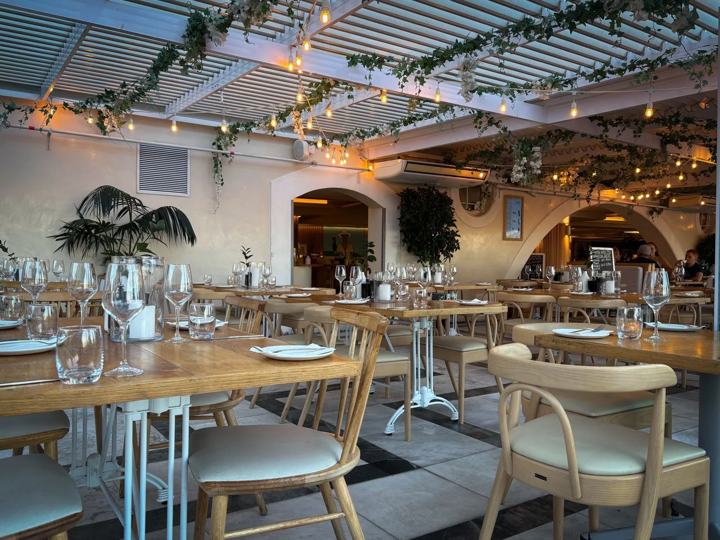 An elegant restaurant dining room with warm lighting